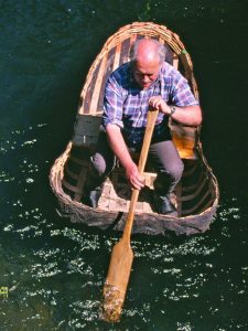 John in a coracle he made himself