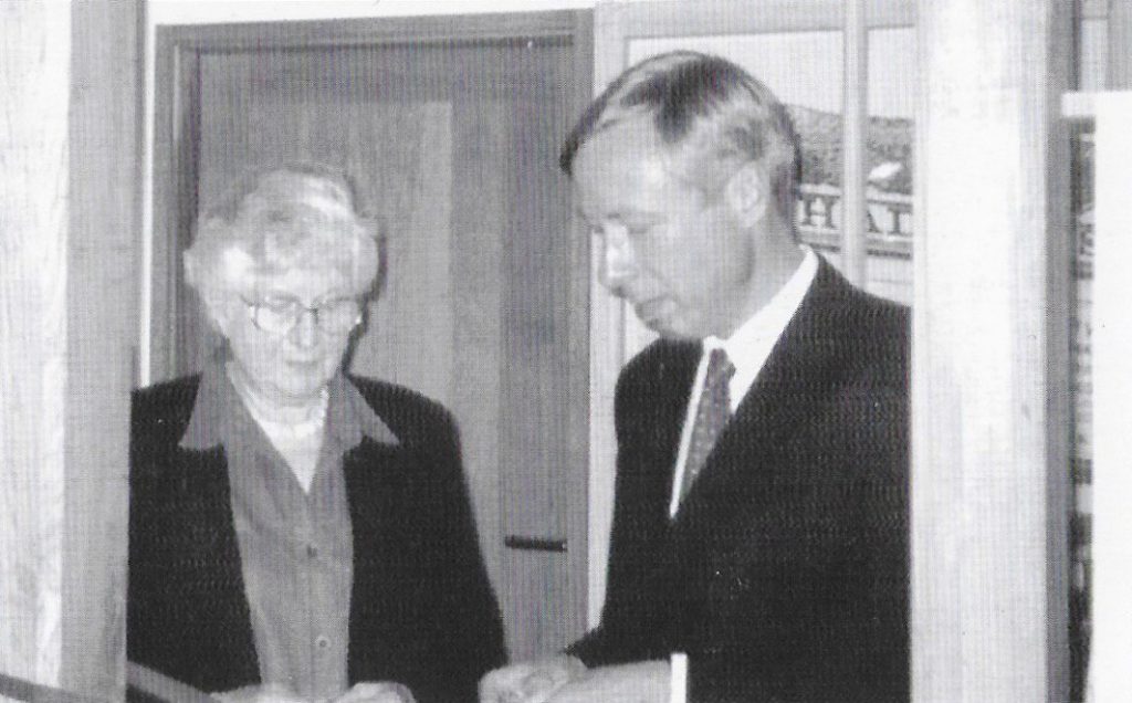 Monica Mullins with Earl Howe, opening the extension. 50 years of the Amersham Society, 2006