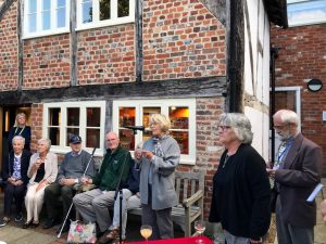 Dorothy Symes welcomes the guests